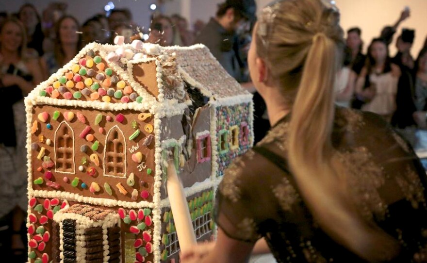 The Gingerbread Demolition lets people destroy gingerbread houses for charity.