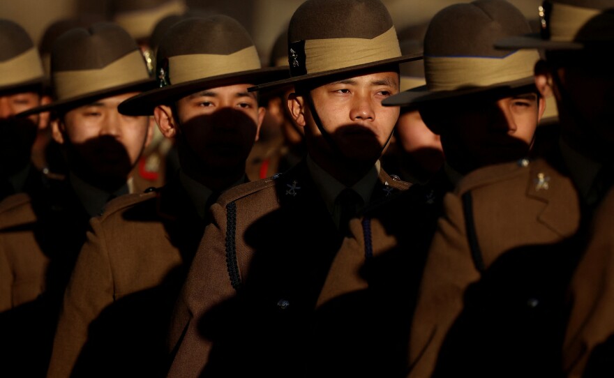 Soldiers from the Brigade of Gurkhas march on the parade ground during a ceremony at England's Catterick Garrison on Nov. 23.