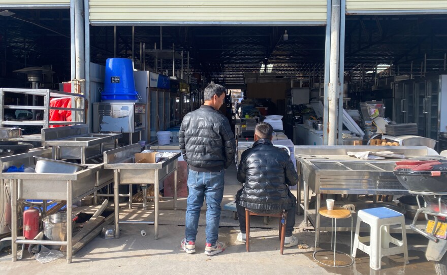 An appliance market in Xi'an, China, where Jiang has a construction equipment rental company. He says economic conditions are worse now than during the pandemic, when he started the appliance business, and he isn't selling as much as he used to.