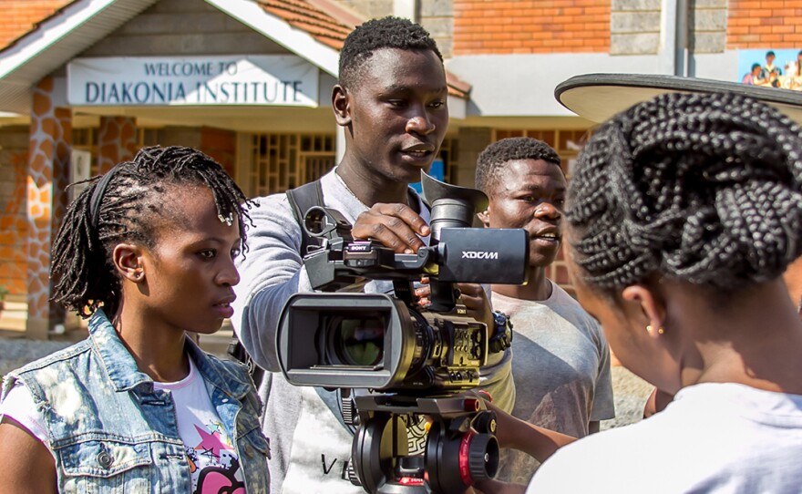 Maxwell Odhiambo (center, holding camera) had one week to make a movie.