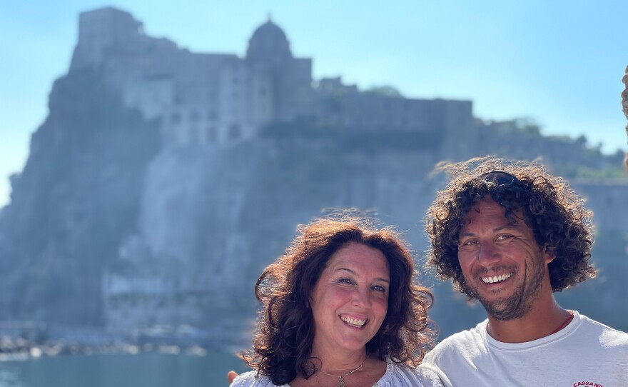 Bettany Hughes with water taxi driver, Ischia. 