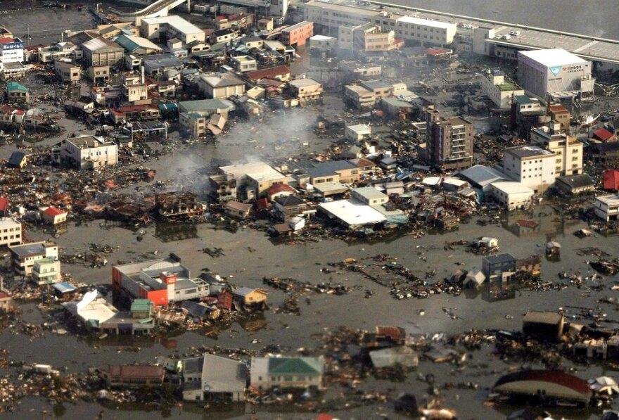 An aerial view of the devastated city of Kesennuma in Japan's Miyagi prefecture on Saturday. A tsunami unleashed by a massive quake wreaked destruction across northeast Japan.