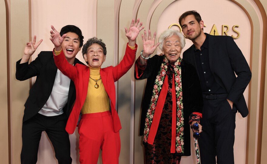 Filmmaker Sean Wang, left, and his grandmothers Chang Li Hua and Yi Yan Fuei, and producer Sam Davis pictured at the Oscar Nominees Luncheon in Beverly Hills on February 12.