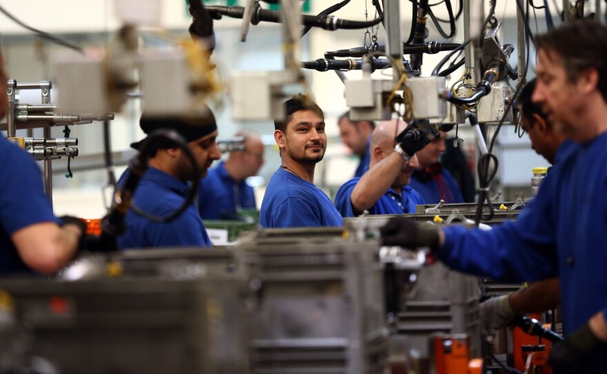 Employees work on an engine production line at a Ford factory in Dagenham, England. Many American firms based in the U.K. are concerned Brexit will adversely impact their businesses.