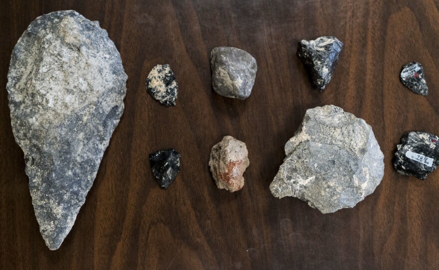 Assortment of Early and Middle Stone Age tools found in the Olorgesailie Basin, Kenya. The tool at left is a hand axe.