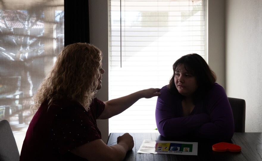 Melody and Angeleena O'Connor sit together at their home. Melody calls DAAY court "a life changer."