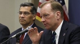 McGregor Scott, right, the United States Attorney for the Eastern District of California, accompanied by California Attorney General Xavier Becerra, discusses an increase in the use of a banned pesticide at illegal marijuana farms hidden on public lands in Sacramento, Calif.  Tuesday, May 29, 2018. 