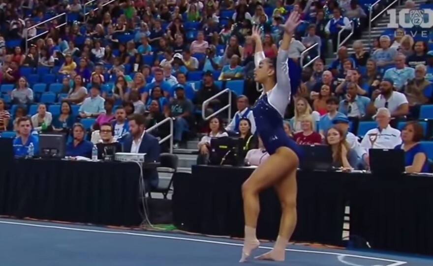Sophina DeJesus, a gymnast for UCLA, performs a floor routine.