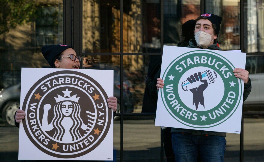 Starbucks workers strike outside a Starbucks coffee shop on Nov. 17, 2022, in Brooklyn, protesting the company's anti-union activities.