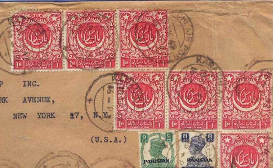 An envelope with early stamps from Pakistan, including the first commemorative stamp (in red) designed by the renowned artist A.R. Chughtai and issued in 1948.