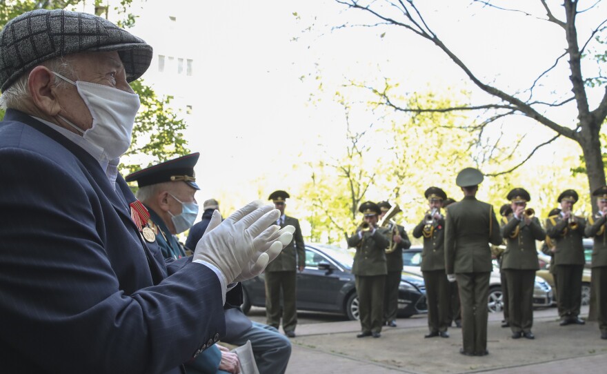 World War II veterans Pyotr Vorobyev (left), 90, and Pavel Yeroshenko, 94, attend a performance in Minsk by the 120th Rogachev Guards Mechanized Brigade of the Belarusian Armed Forces ahead of the 75th anniversary of the victory in World War II. Belarus is raising eyebrows — and concerns — by going ahead with a mass military parade marking the anniversary on Saturday.