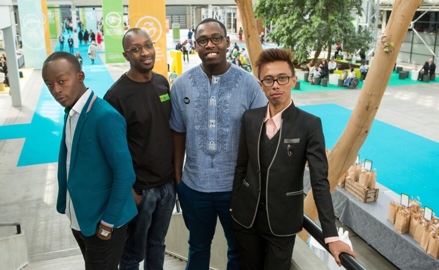 They're guys who stand up for women's rights. Left to right: Patrick Segawa and Steven Twinomugisha of Uganda, Mark Gachagua of Kenya and Bryan Eric Mallari of the Philippines at the Women Deliver conference.