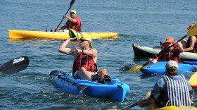 Military veterans kayak during the National Veterans Sports Clinic in San Diego.