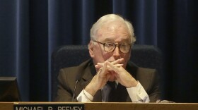 California Public Utilities Commission President Michael Peevey is pictured listening to public comments during a meeting of the five-member commission in San Francisco, Dec. 18, 2014. 