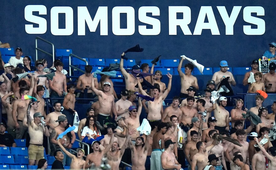 Tampa Bay Rays fans cheer on the team during the eighth inning of a baseball game against the Baltimore Orioles Monday, May 18, 2026, in St. Petersburg, Fla.