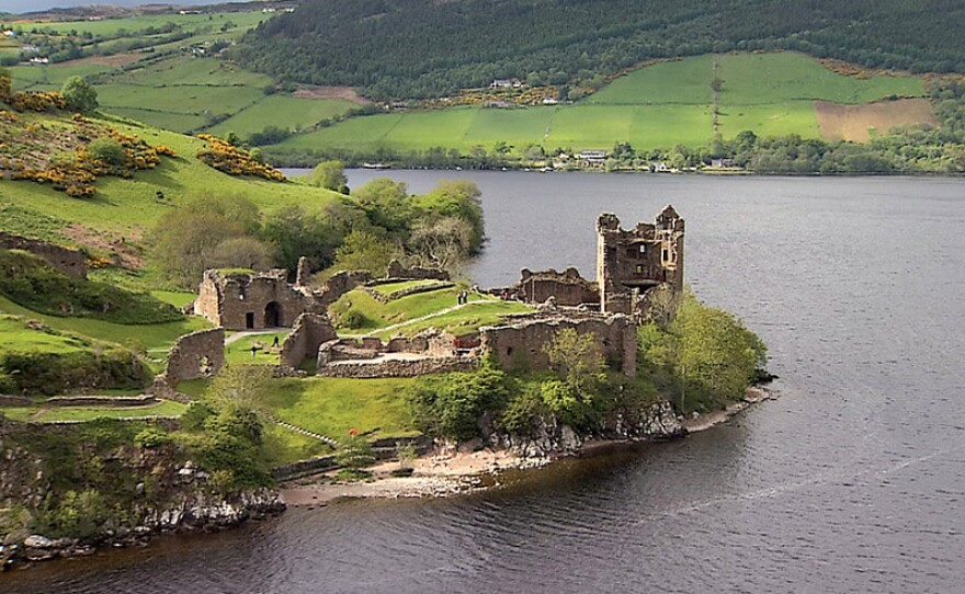 Urquhart Castle sits beside the Loch Ness in the highlands of Scotland.