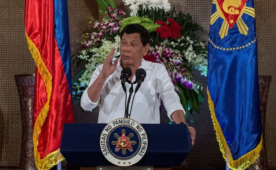 Philippine President Rodrigo Duterte gives a speech during Eid al-Fitr celebrations marking the end of Ramadan at the Malacanang Palace in Manila on June 27.