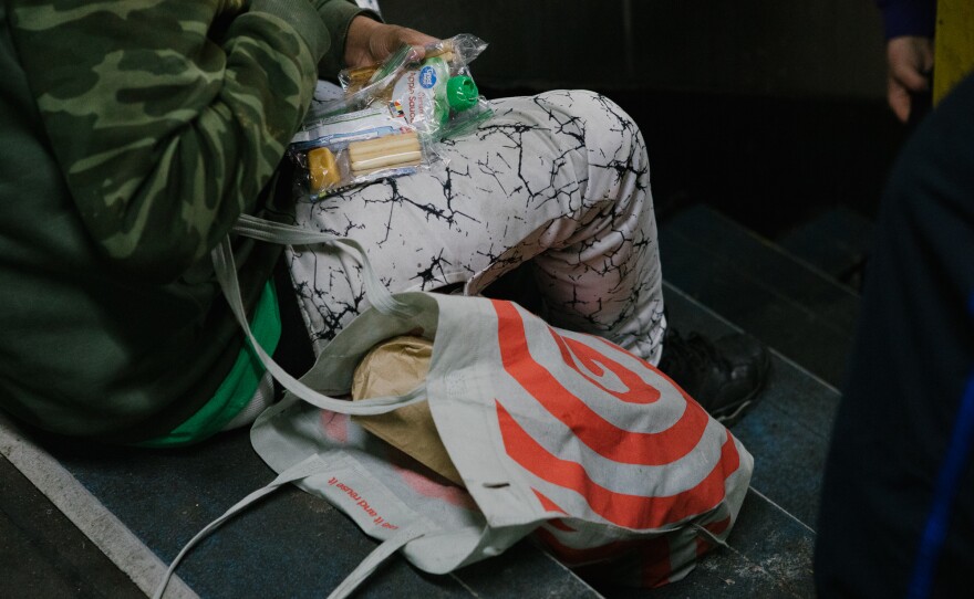 A homeless man on the Market-Frankford Line was given food by outreach services.