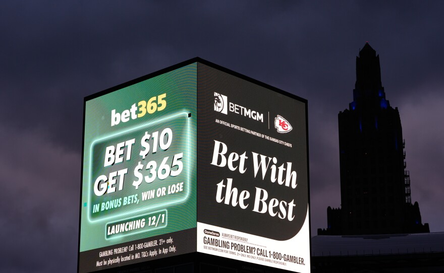 Advertisements for sports betting apps are seen in downtown Kansas City, Mo., in November.