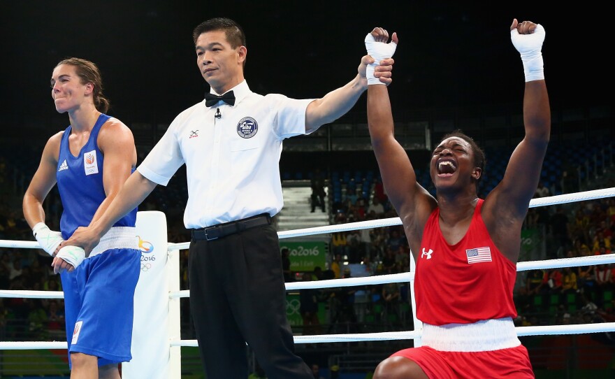 Claressa Maria Shields of the U.S. celebrates her gold medal win over Nouchka Fontijn of the Netherlands in the women's middleweight bout at Riocentro, on the last day of the Rio 2016 Olympic Games.