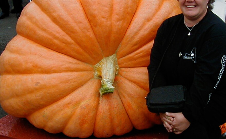 Competitor Deb Sundstrom with her oversized pumpkin.