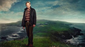 Douglas Henshall as DI Jimmy Perez in SHETLAND, a murder mystery set against the stunning Scottish backdrop of the Shetland Isles.