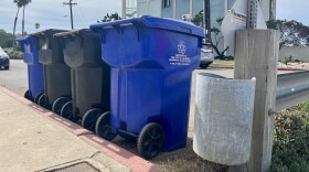 Recycling and trash cans sit curbside in Ocean Beach, San Diego on Sept. 17, 2025.