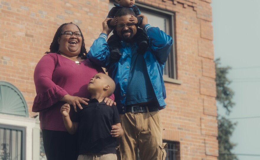 Stamper with her husband, Pete, and two sons at their home in Washington, D.C.