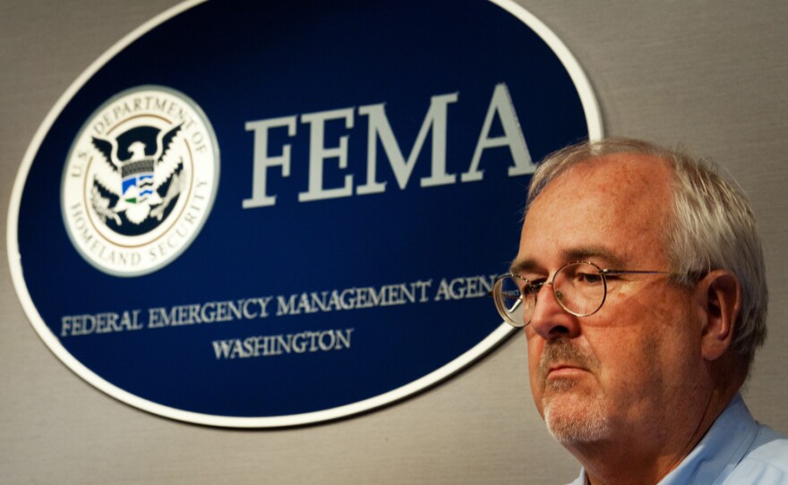 FEMA Administrator Craig Fugate, shown at a press briefing last week in Washington, says his agency will postpone some repair work on earlier disasters in order to pay for the immediate needs of Irene.