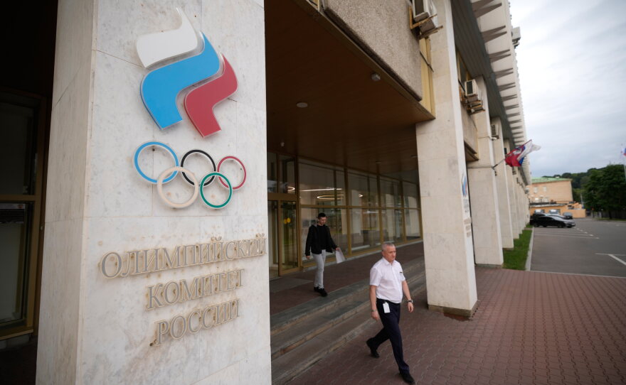 A man walks outside the Russian National Olympic Committee building in Moscow on Tuesday.