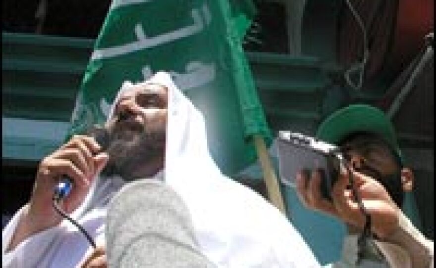 Nizar Rayyan, a local leader of Hamas, addresses an anti-Israeli rally in Gaza City, Aug. 5, 2005.