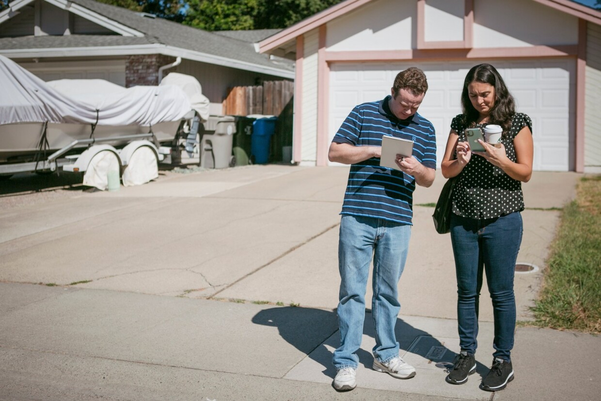Taylor Kayatta (left) and parent-teacher Vanessa Cudabac (right) during a door-to-door campaign strategy on Aug. 13, 2022. Kayatta is running for Sacramento City Unified School District Board Area 6.