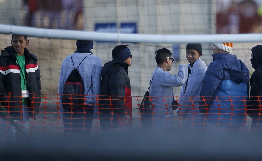 Teen migrants wait in line inside the Tornillo detention camp in Tornillo, Texas in Dec. 2018.