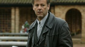 Promotional image of the character Alec Pickman (Rupert Graves) from "Inspector Lewis, Series III: Falling Darkness."