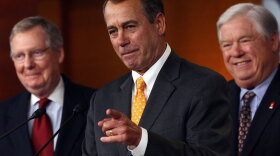 House Minority Leader John Boehner answers questions from reporters at the Capitol with Senate Minority Leader Mitch McConnell (left) and Mississippi Gov. Haley Barbour on Wednesday. Following Tuesday's midterms, Republicans stand ready to take control of the House of Representatives, with Boehner likely becoming the next speaker.