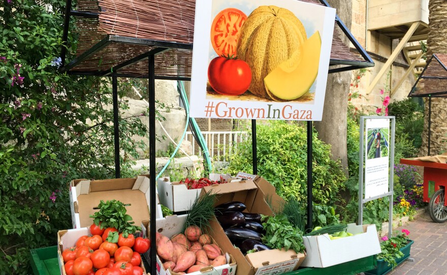 A cart in the garden of the U.S. Consulate in Jerusalem displays produce grown in Gaza: tomatoes, sweet potatoes, eggplant, sweet and hot peppers, green onions and herbs. Like all products leaving Gaza, this shipment needed Israeli approval.