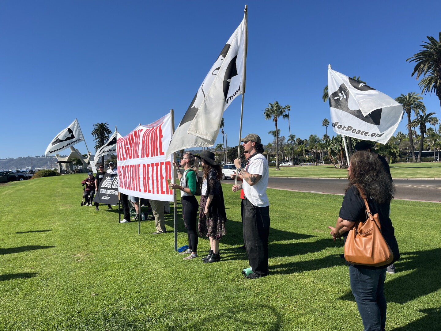 Protesters gather at Shelter Island ahead of USS Lincoln arrival on Oct. 8, 2026.