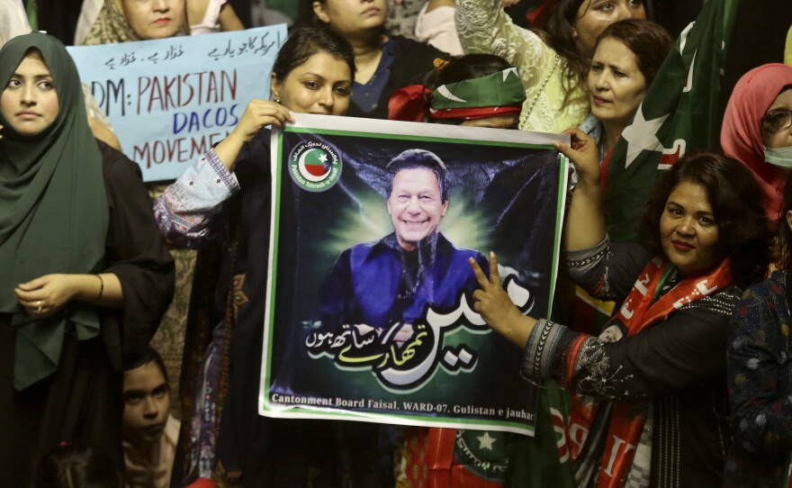 Supporters of deposed Prime Minister Imran Khan's party participate in a rally to condemn the ouster of their leader's government, in Karachi, Pakistan, on Sunday, April 10, 2022.