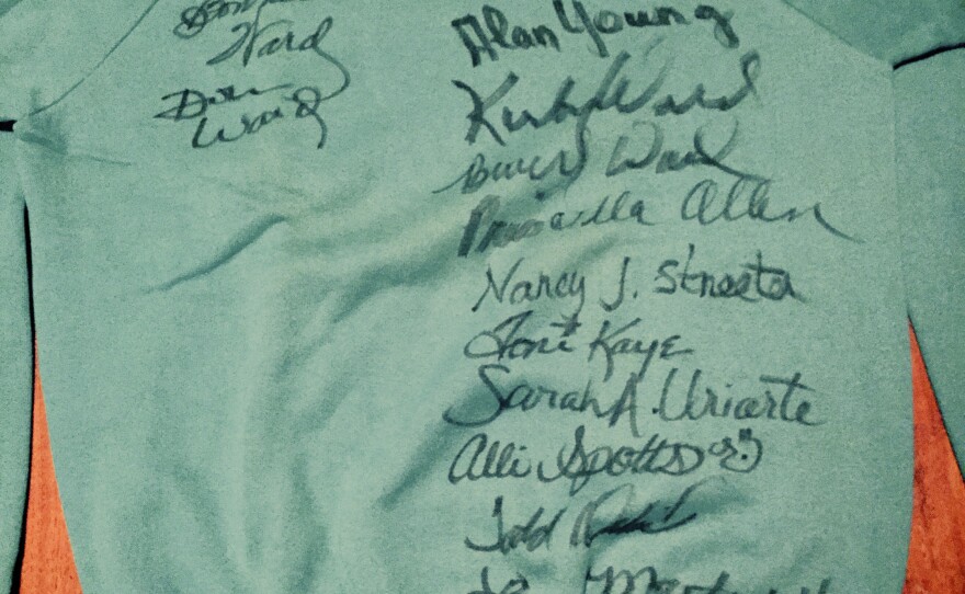 Pictured is a sweatshirt signed by the crew who worked backstage at the Starlight Bowl.