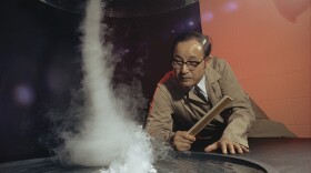 Tetsuya Fujita studies a tornado formation in his lab at the University of Chicago. Fujita developed the Fujita scale, a schematic for measuring the intensity of tornadoes. (undated photo)