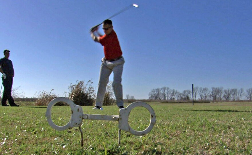 Golfers at the Prison View Golf Course near the Louisiana State Penitentiary in Angola, La., in a photo released by the Golf Channel.