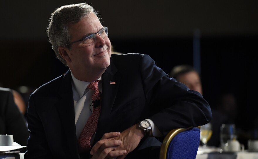 Former Florida Gov. Jeb Bush listens before a Nov. 20 speaking engagement in Washington.