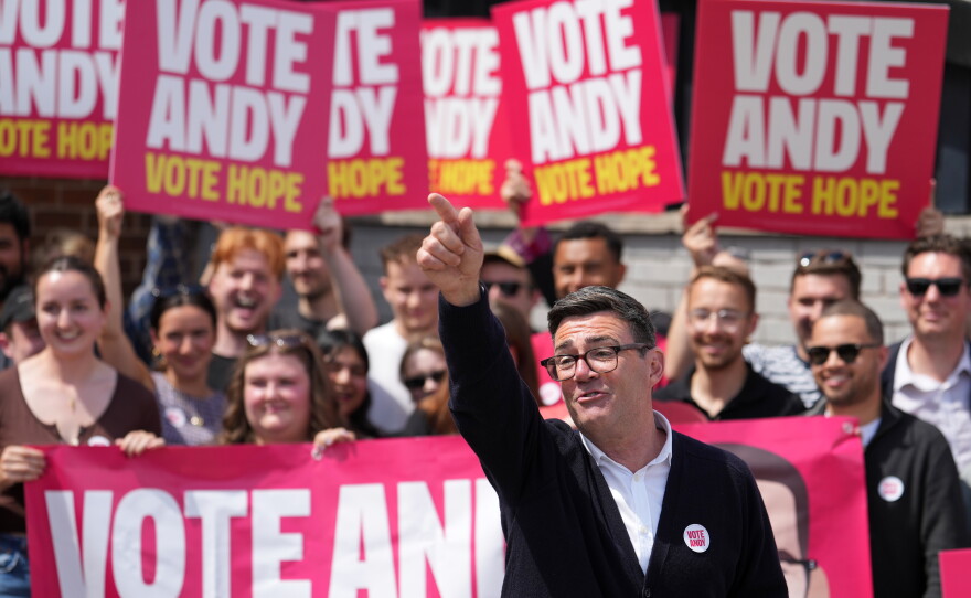 Andy Burnham, Britain's Labour candidate for Makerfield, gestures in front of supporters during the by-election in Makerfield, England, Thursday, June 18, 2026 where voters are choosing a new lawmaker with Andy Burnham of the Labour Party as the leading contender.