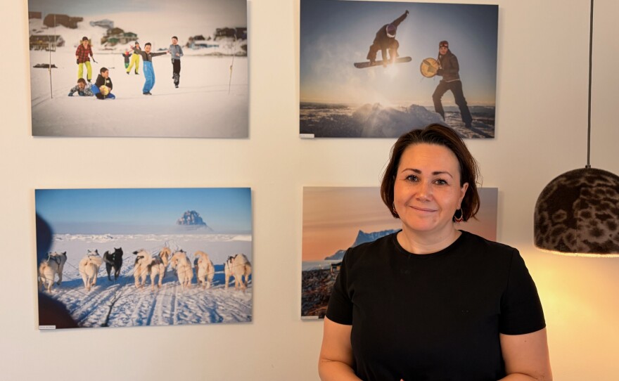 Parliamentarian Aaja Chemnitz stands in front of a row of photos from her native Greenland. As one of the only lawmakers from Greenland in the Danish Parliament, Chemnitz says she hopes Trump's threats don't distract from real domestic issues her voters in Greenland face on a daily basis. Chemnitz, along with U.S. Sen. Lisa Murkowski, has been nominated for a Nobel Peace Prize for her efforts in de-escalating tensions between the U.S. and Greenland.