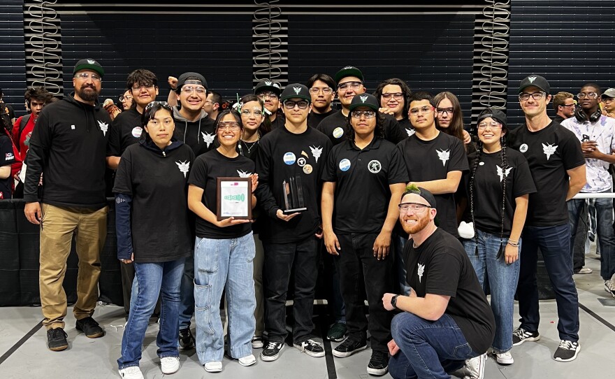 The Lincoln High School Steel Stingers team poses for a photo holding the Rookie All-Star trophy, at the UC San Diego campus, La Jolla, Calif., March 24, 2024.