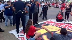Protesters are arrested after refusing to leave a City Heights intersection, Sept. 4, 2013.