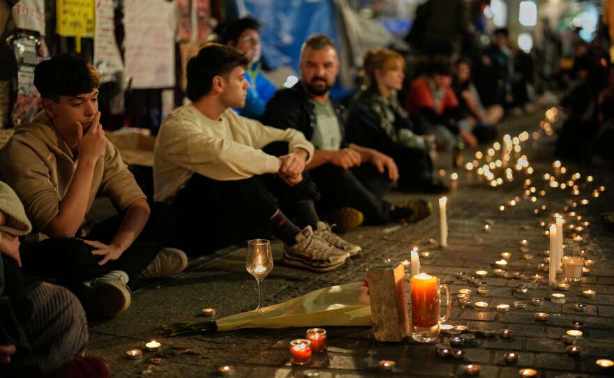 Protesters gather after the reported death of María del Carmen Abascal, the 87-year-old woman whose eviction sparked nationwide protests, in Puerta del Sol square in Madrid, Wednesday, Oct. 7, 2026.