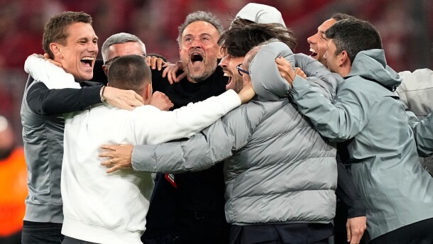 PSG's head coach Luis Enrique, center, celebrates with the other members of the team after the Champions League semifinal second leg soccer match between Bayern Munich and Paris Saint Germain in Munich, Germany, Wednesday, May 6, 2026.