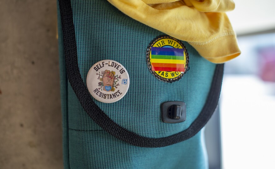 Elliott's bag hangs on a hook at the salon Ginger & Maude in Portland, Ore.
