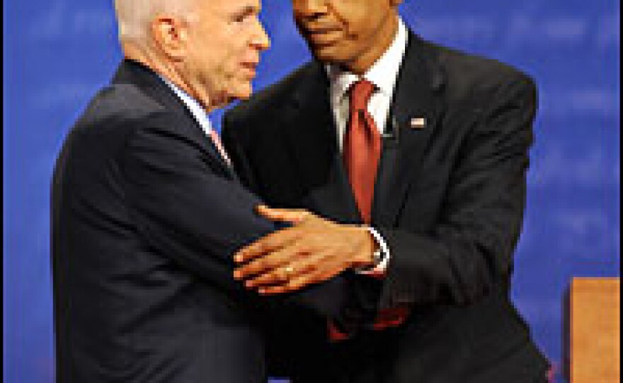 Republican presidential nominee John McCain and Democratic presidential nominee Barack Obama shake hands on stage after the first debate of the 2008 election season, Sept. 26, 2008, at the University of Mississippi in Oxford, Miss.